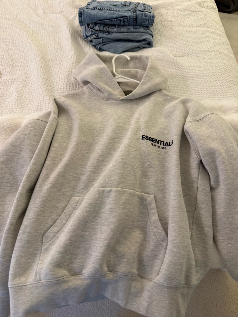 Essentials women's Light Gray Hoodie with Subtle Chest Logo